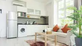 Cozy 1BR apartment by beach - partial ocean view