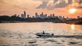 Sunset motorboat cruise on the Vistula river with prosecco