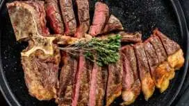 Florentine-style steak cooking experience with a chef and unlimited wine