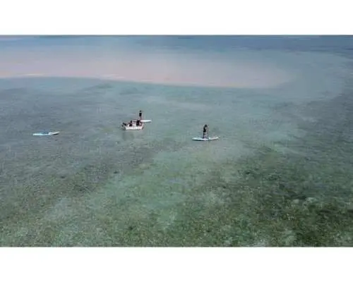SUPで行くユニの浜上陸ツアー！初心者歓迎！ 小型ボート並走で安全､楽々！ツアー実績9年ドローン撮影無料！写真無料！全費用込み