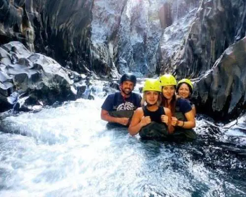 River trekking guided experience in the Alcantara Gorges