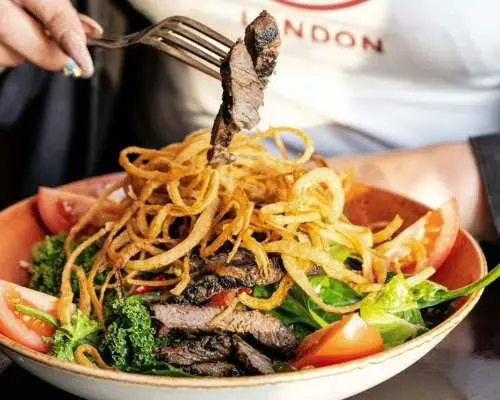 ประสบการณ์การรับประทานอาหารที่ Hard Rock Cafe ไทม์สแควร์ นิวยอร์ก