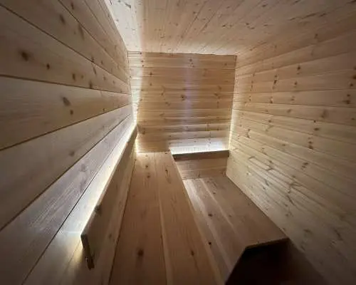 [Minami-Furano, Hokkaido] Relax amidst the dappled sunlight and clear stream. Experience an outdoor sauna in the heart of nature!