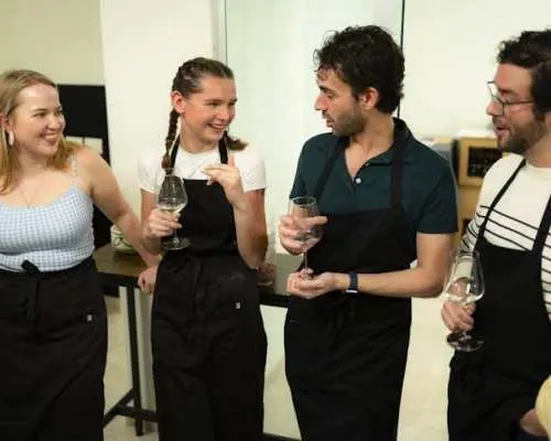 Fresh pasta and tiramisù cooking class with wine pairing in Milan