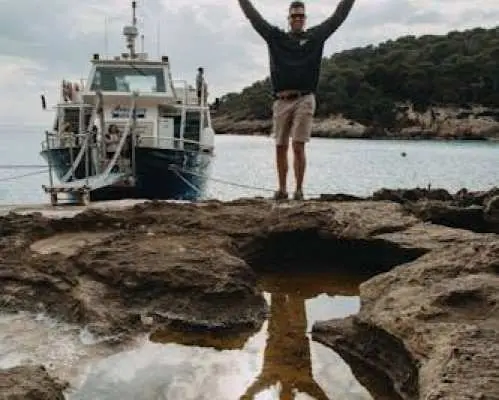 Boat cruise from Cala’n Bosch with snorkelling and onboard bar