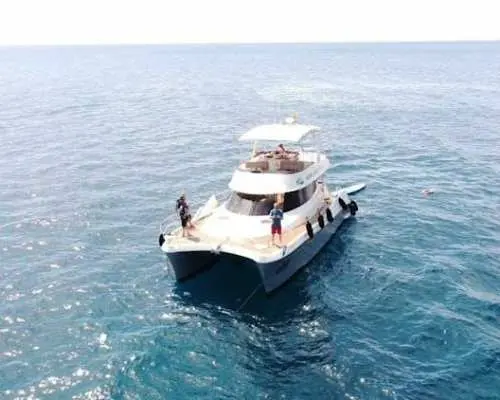 Small group catamaran cruise with water sports and transport