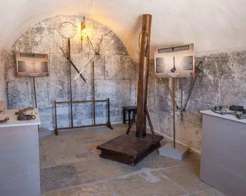 Lords of the Night Prison Palace: tour to the cells and torture tools