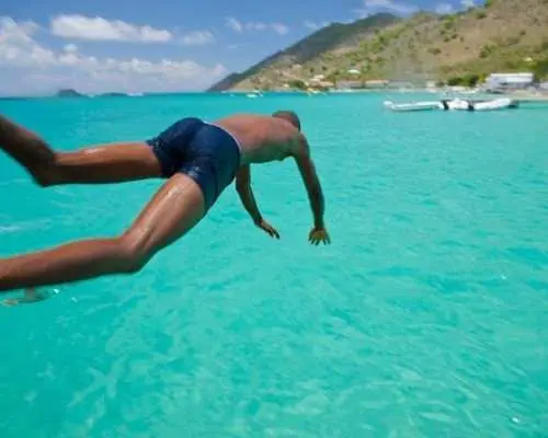 Three Saint Martin beaches catamaran tour with BBQ and open bar