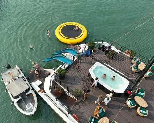 Ha Long Bay Deluxe Day Cruise with Buffet Lunch, Kayaking & Sunset Party | Limousine Transfer | Small Group (Max 20)