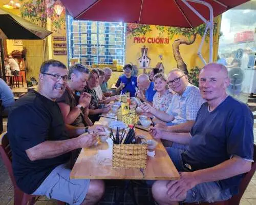 Explore Hanoi Nightlife With Street Foods & Fun by E-Scooter