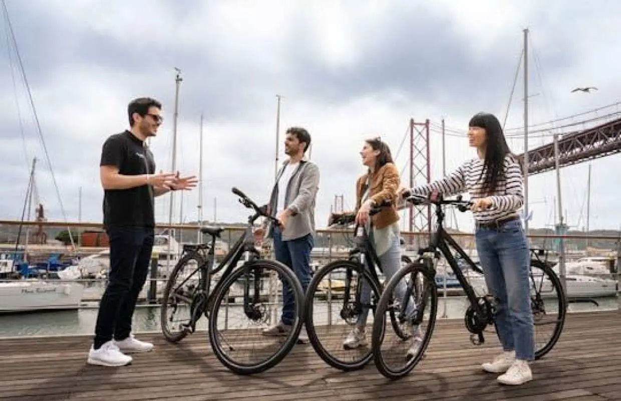 Lisbon bike tour, Tagus cruise and helicopter flight