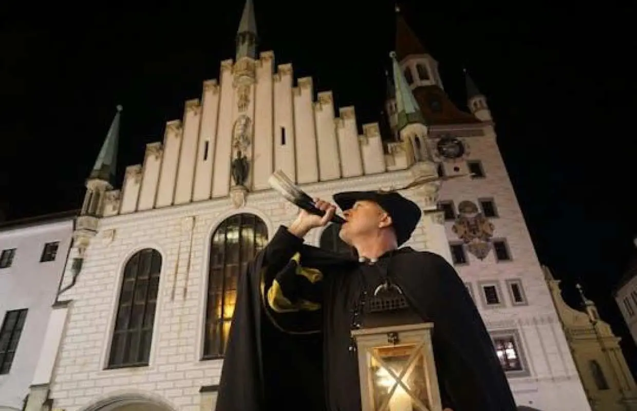 Night watchman guided tour through medieval Munich in German