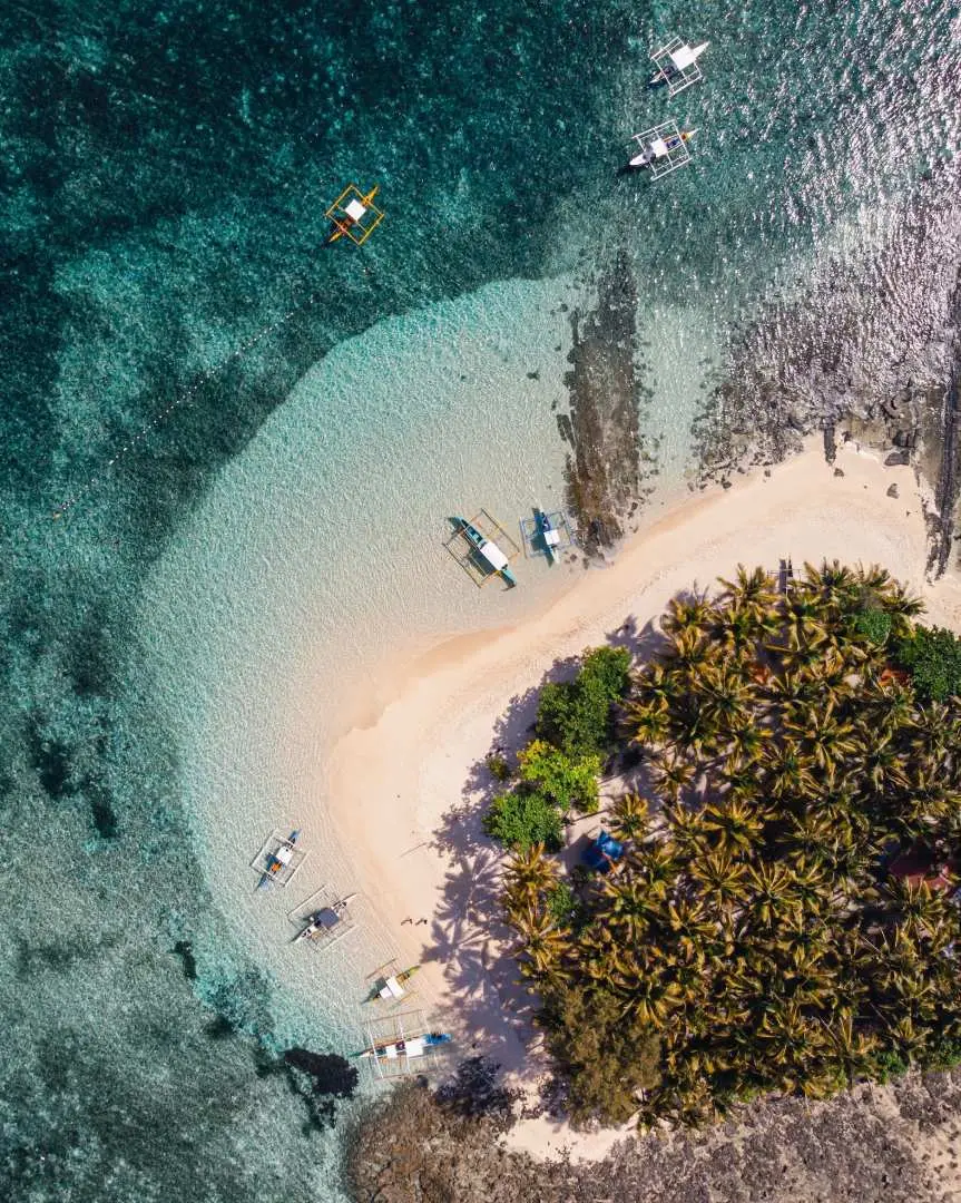Arrive at Guyam Island, a tear-drop-shaped exotic island near Surigao del Norte