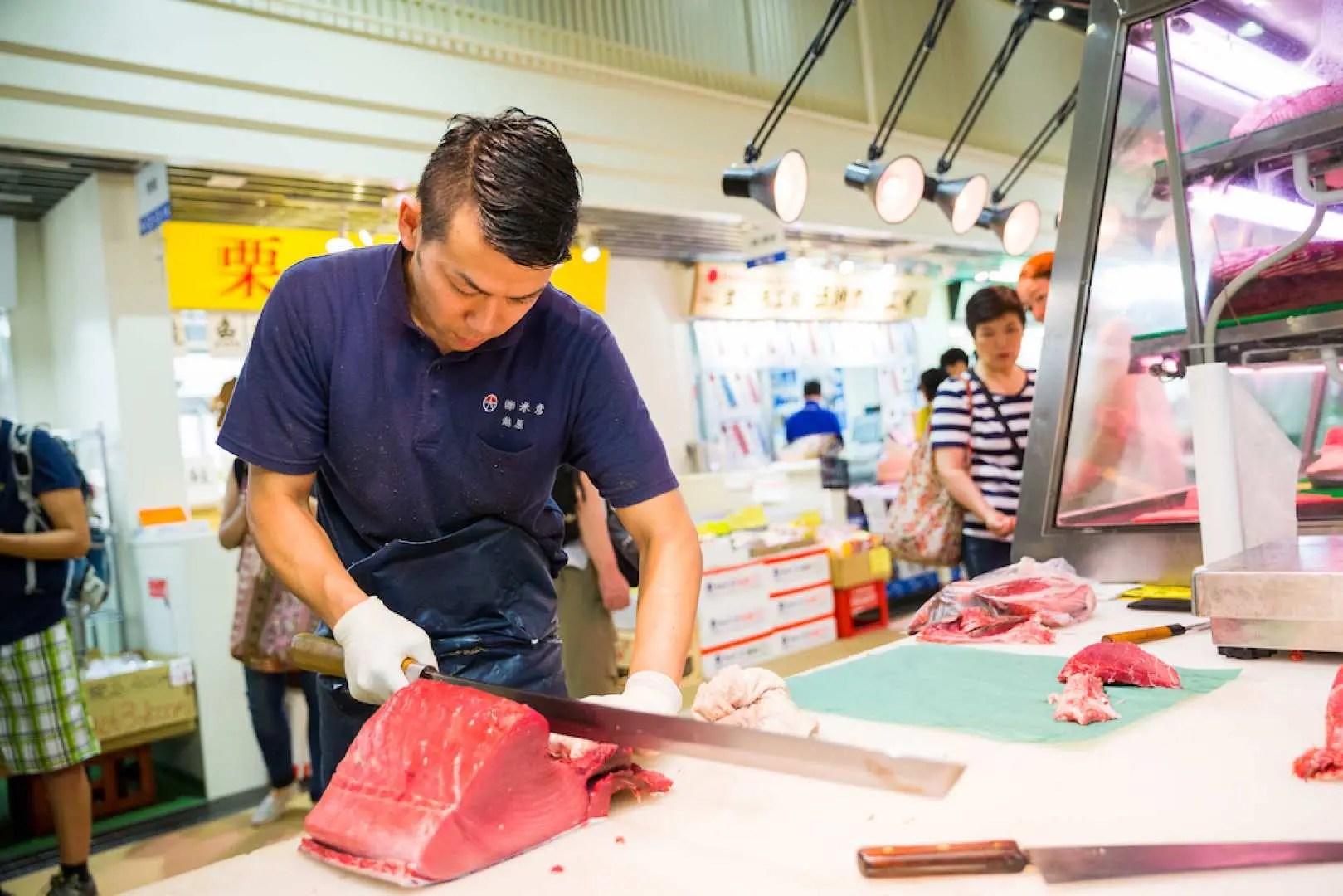 Witness a fascinating tuna cutting demonstration, showcasing the artistry and skill of the local experts