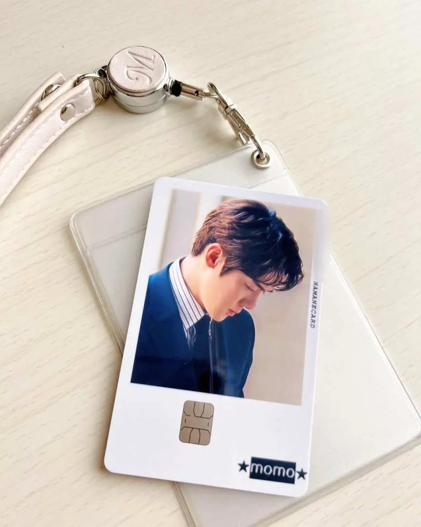Practical display of a Korean NAMANE customized card, featuring a KPOP male idol's photo and attached to a retractable card holder, convenient for foreign visitors to use across South Korea.