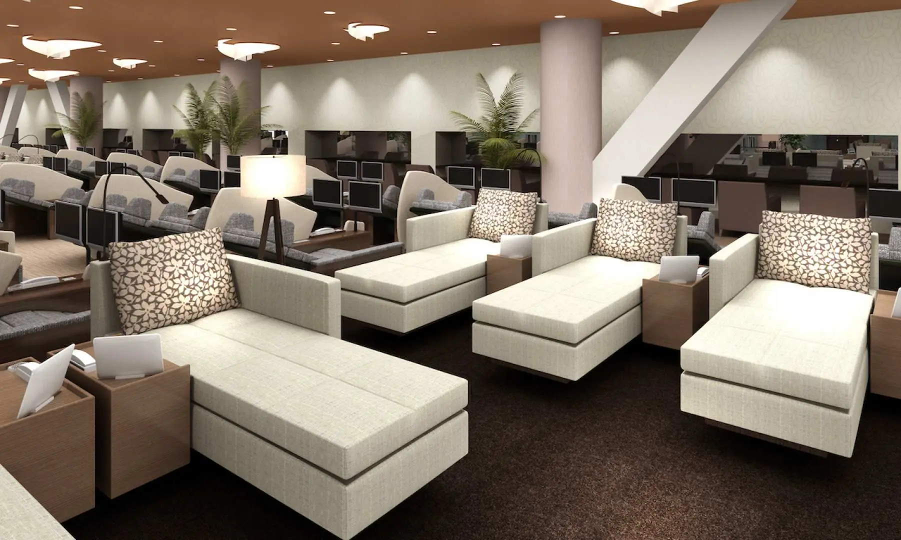 A stylish and spacious relaxation lounge at Tokyo Dome Natural Onsen Spa LaQua, furnished with numerous comfortable chaise lounges and side tables, offering a perfect private space to unwind after bathing.