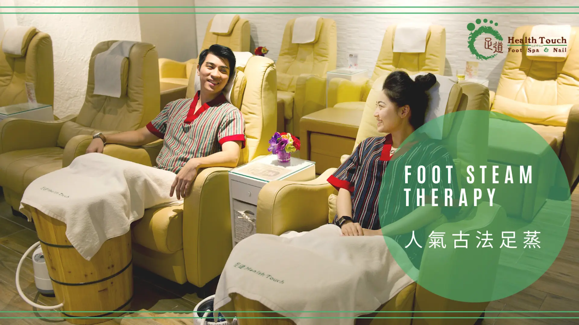 Couple enjoying traditional foot steam therapy in wooden barrels at Health Touch Foot Spa & Nail in Causeway Bay, promoting relaxation and detoxification.