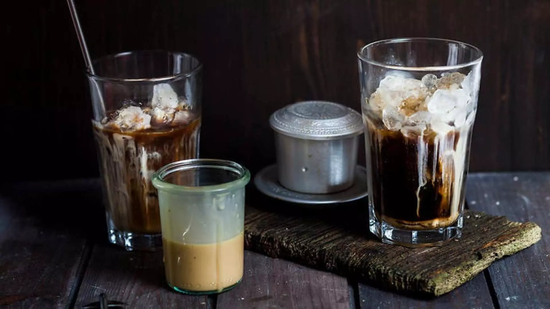 Enjoy classic Vietnamese iced coffee (Cà Phê Sữa Đá) served with a traditional phin filter, a perfect refreshing and aromatic beverage to conclude your Da Nang half-day street food tour.