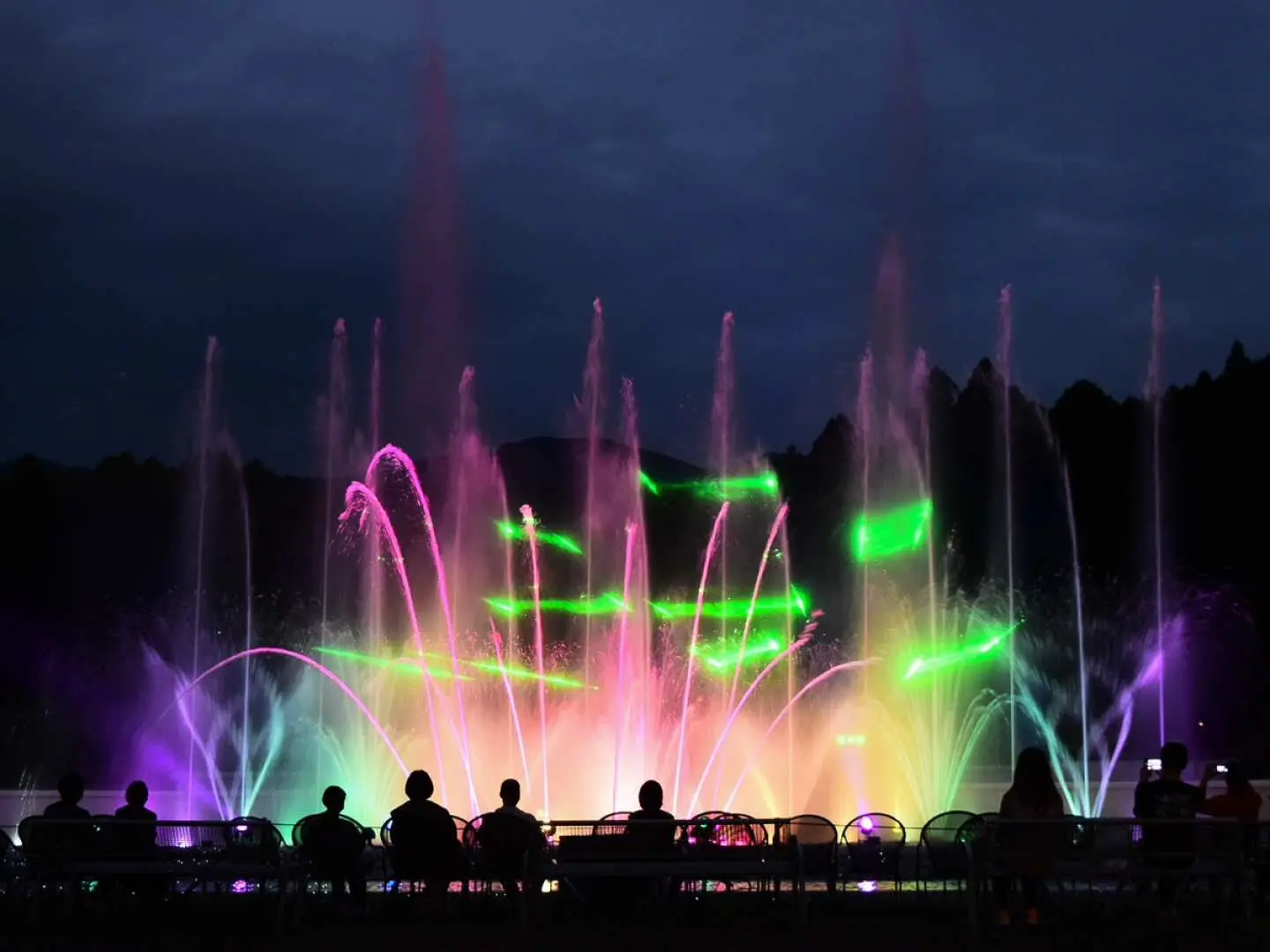 Japan Shizuoka Toki no Sumika Illumination's laser fountain show, featuring vibrant water dances and colorful laser beams, captivating audiences with a stunning visual experience.