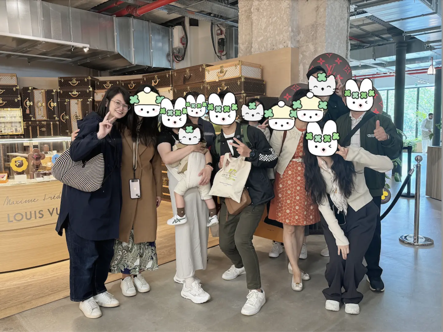A group of friends happily posing inside a luxury boutique in Paris, enjoying the freedom of exploring shopping options during their customized tour with a local assistant.