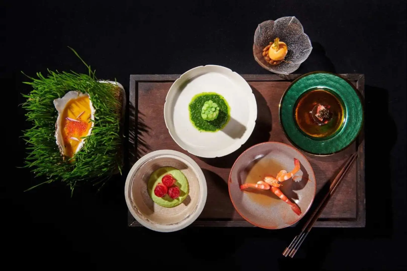 Close-up of Beijing Palace Banquet's exquisite cuisine, featuring multiple artfully plated imperial dishes that highlight the luxurious sensory experience of the royal feast.