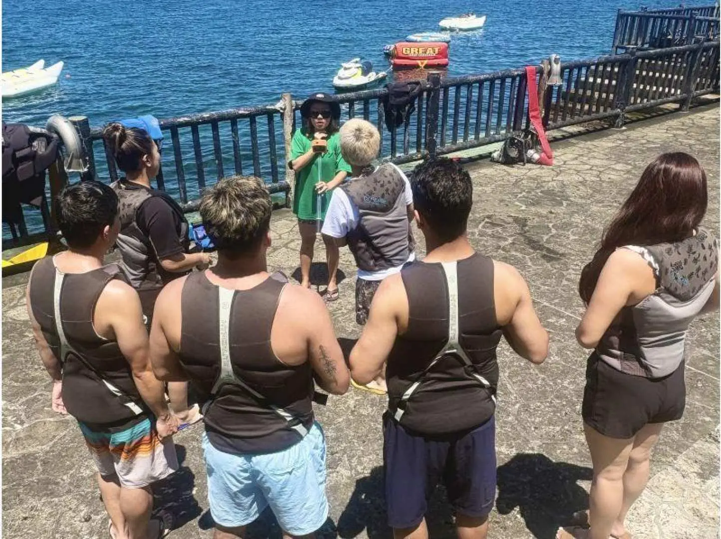 Safety Management and Support System Guide. Before your experience, we provide thorough preparations and explanations to ensure all our customers can enjoy themselves safely and with peace of mind.

First, our staff will confirm the correct way to wear your life jacket and adjust the size to fit your body. We will carefully check the buoyancy and the tightness of the belt, so even those who are not strong swimmers can feel at ease.

Next, we will clearly explain the key points of how to ride, position, and operate each marine activity you will be participating in.

・Correct way to hold and stand

・How to maintain balance

・How to deal with falls

・Precautions to avoid overexertion

We will explain these points concretely so that even beginners can easily understand them.

We will also explain the signals and gestures used at sea, as well as how to communicate with staff, in advance, so that we can respond immediately in case of an emergency.

After all explanations are complete, we will listen to any concerns or questions you may have, and the experience will begin only after you are fully satisfied. Therefore, even first-timers and those with children can participate with peace of mind.