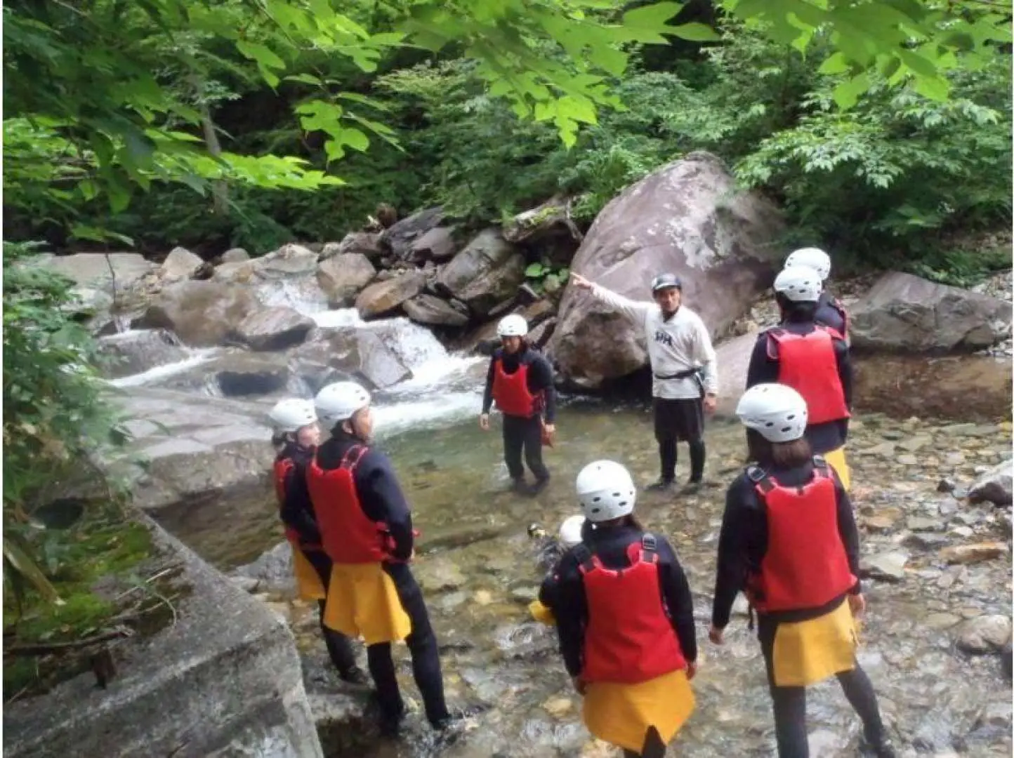 Safety Talk: This section provides explanations on how to walk in the stream and hand signals to ensure a safe canyoning experience.