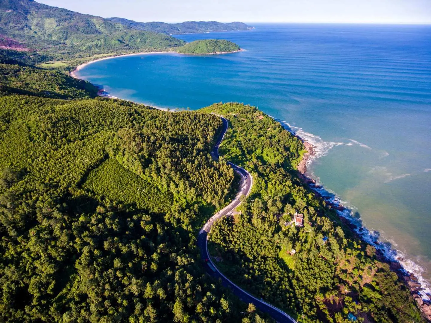 Stop at Hai Van Quan for sightseeing and photos of the mountain pass and ocean views
Hai Van Pass is known as one of the most beautiful mountain roads in Vietnam. Located between Da Nang and Hue, the pass offers spectacular panoramic views of the coastline, mountains, and clouds.
At the top of the pass, guests will visit Hai Van Quan, an ancient historical gate built during the Nguyen Dynasty. This is also one of the best photo stops on the trip.
Highlights:
Stunning ocean & mountain scenery
Historical Hai Van Gate
Famous winding coastal road
Great photography spot