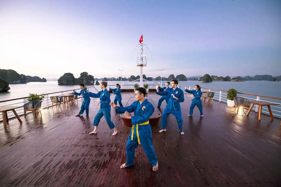 Start the day with the session of Vovinam on the sundeck.