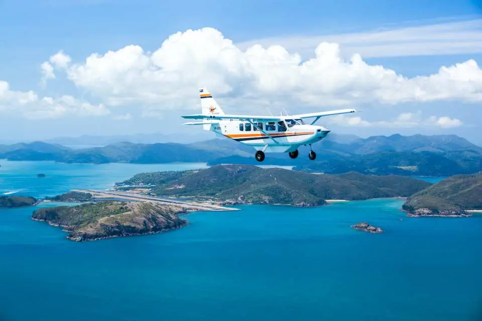 plane flying over whitsundays