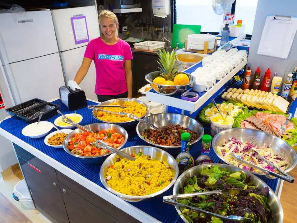 A bountiful buffet meal on the Cairns Great Barrier Reef liveaboard dive yacht, offering diverse fresh food to ensure dive students stay energized during the course.