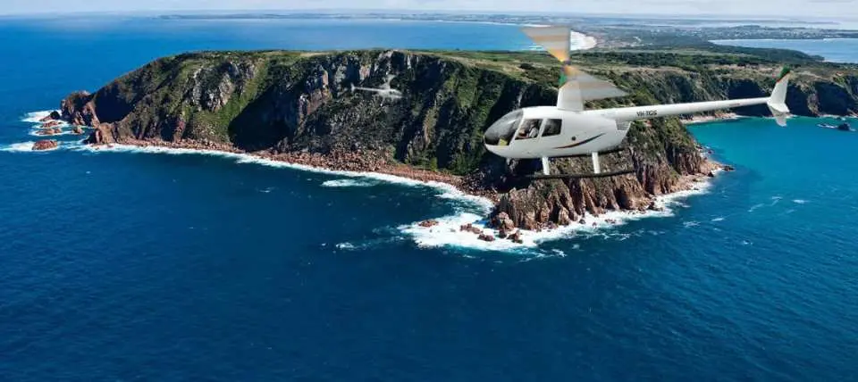 aerial view of helicopter flying over phillip island