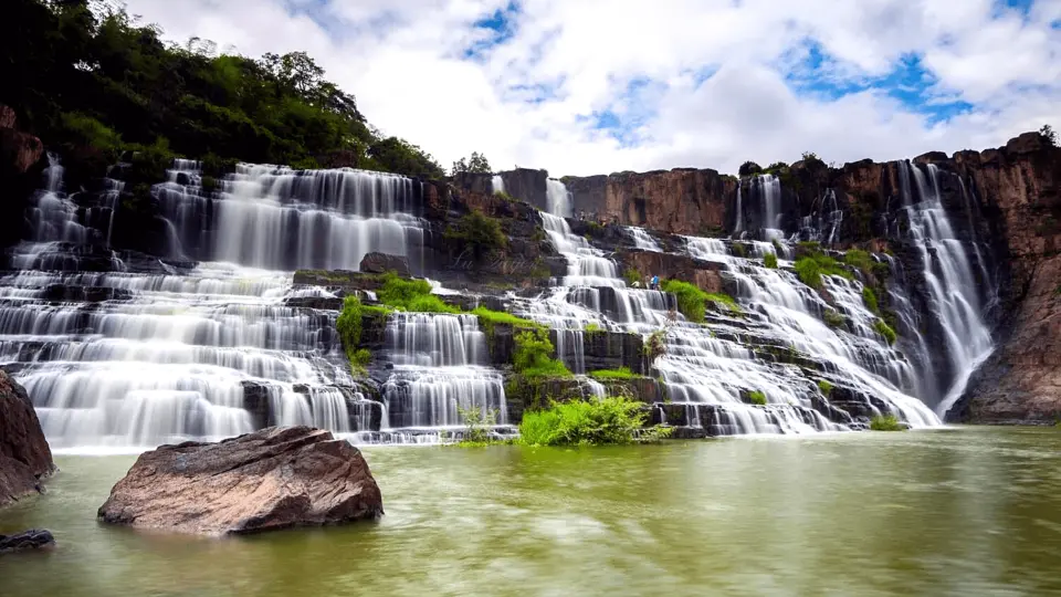 Wander around the Pongour Waterfall, located about 50 km away from Da Lat city, also known as the 7-level waterfall
