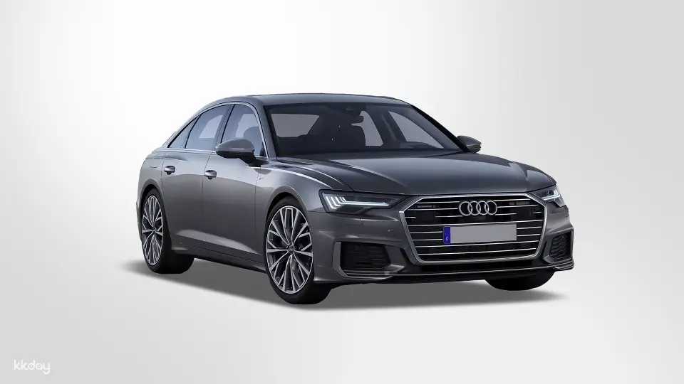 A dark grey Audi A6 luxury sedan, representing the premium and comfortable private airport transfer experience in Shanghai, ideal for business travelers.