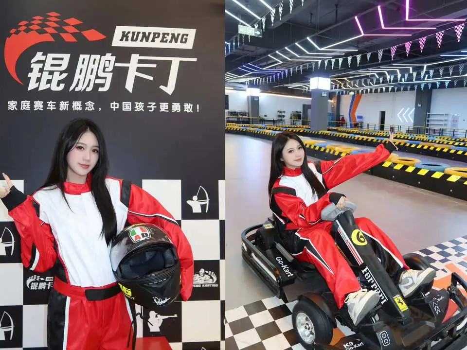 珠海橫琴錕鵬高卡車運動中心，身穿專業賽車服的女性與F1仿生高卡車合照，展現場地提供的刺激賽車體驗。