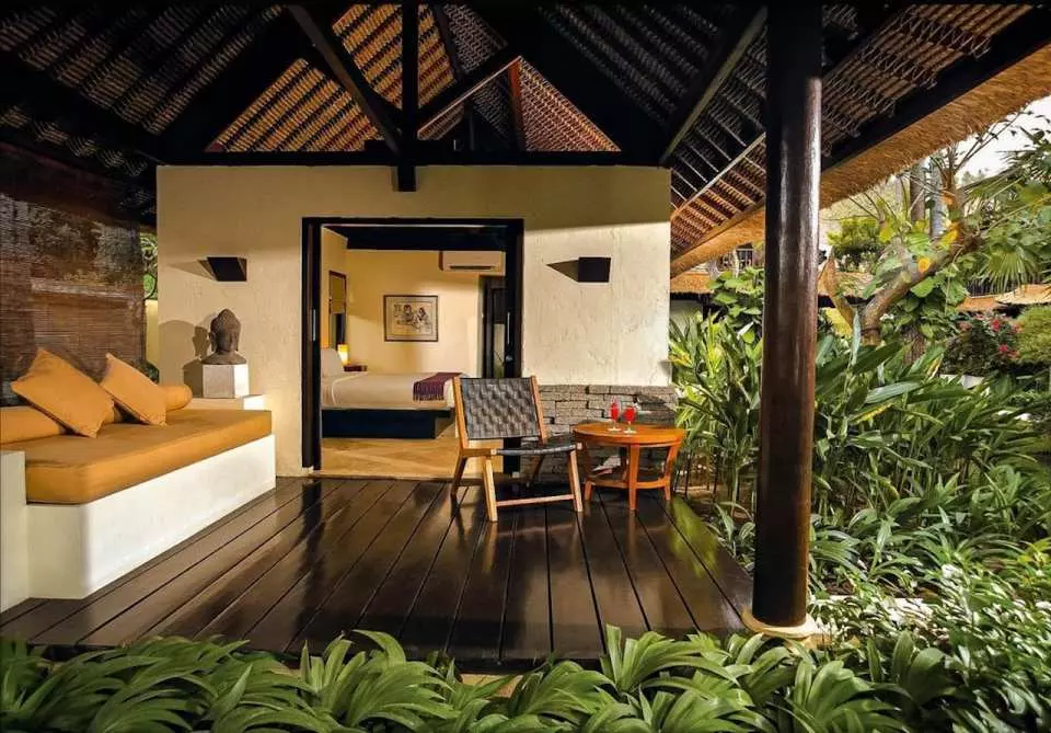 Enjoy the peaceful ambiance of garden view rooms adorned with local art and comfortable furnishings