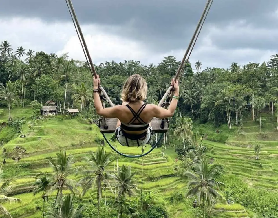 Feel the thrill of soaring above lush landscapes as you enjoy a traditional Balinese swing