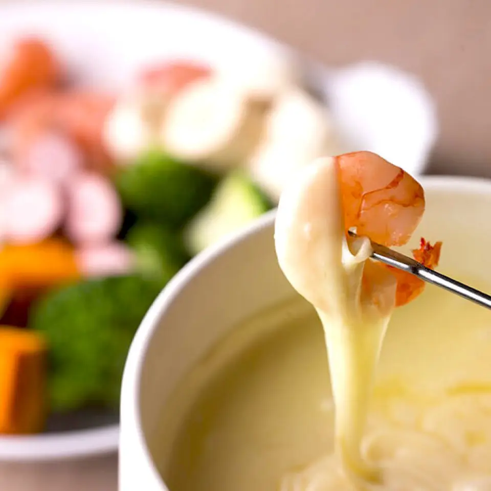 Shrimp & Cheese Fondue is an exquisite combination of fresh shrimp and rich cheese. The plump shrimp and melted cheese mix together in your mouth, creating an exquisite taste.