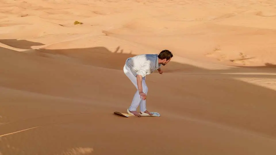 Try sand surfing