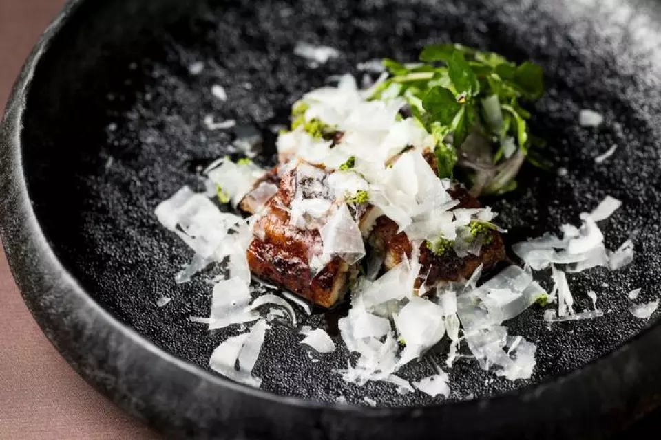 Charbroiled eel is available at dinner time, accented with pecorino cheese and pickled Japanese pepper.