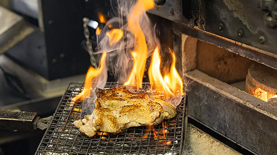 Our proud "Chicken Steak" is grilled over hickory wood! It's crispy on the outside and incredibly juicy on the inside. The smoky aroma will whet your appetite. Enjoy this special dish!
