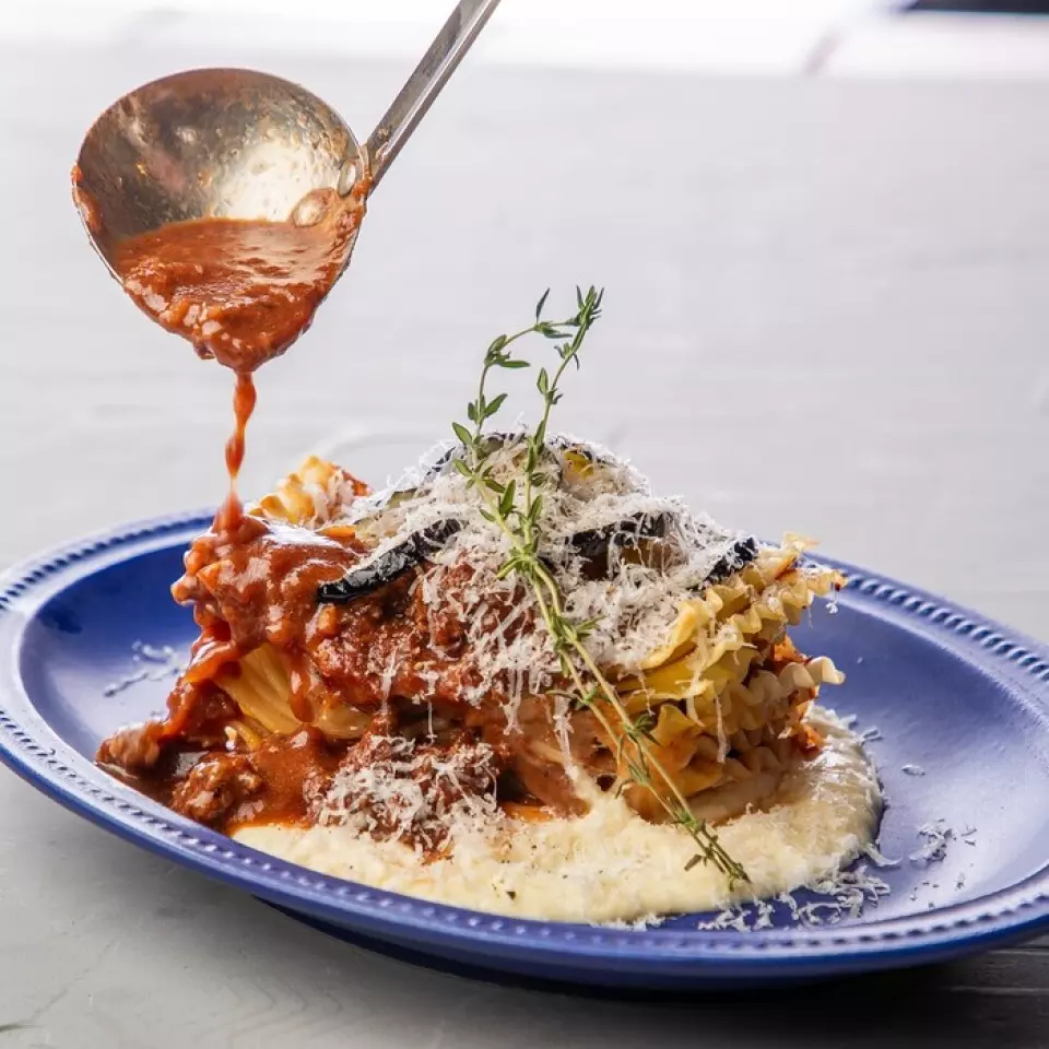 #802's most popular dish. Enjoy this piping hot 8-layer lasagna with 3 types of sauce.
