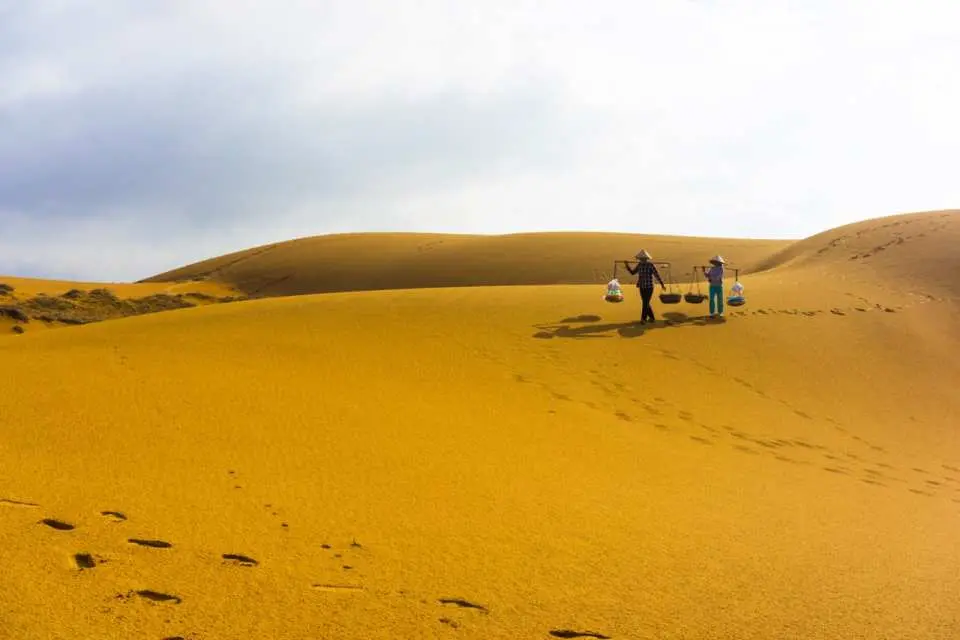 Head to the Yellow Sand Dune, also known as the Flying Sand Dune - which came from the wind reshape the sand dune everyday, creates an ever-changing charm for this place.