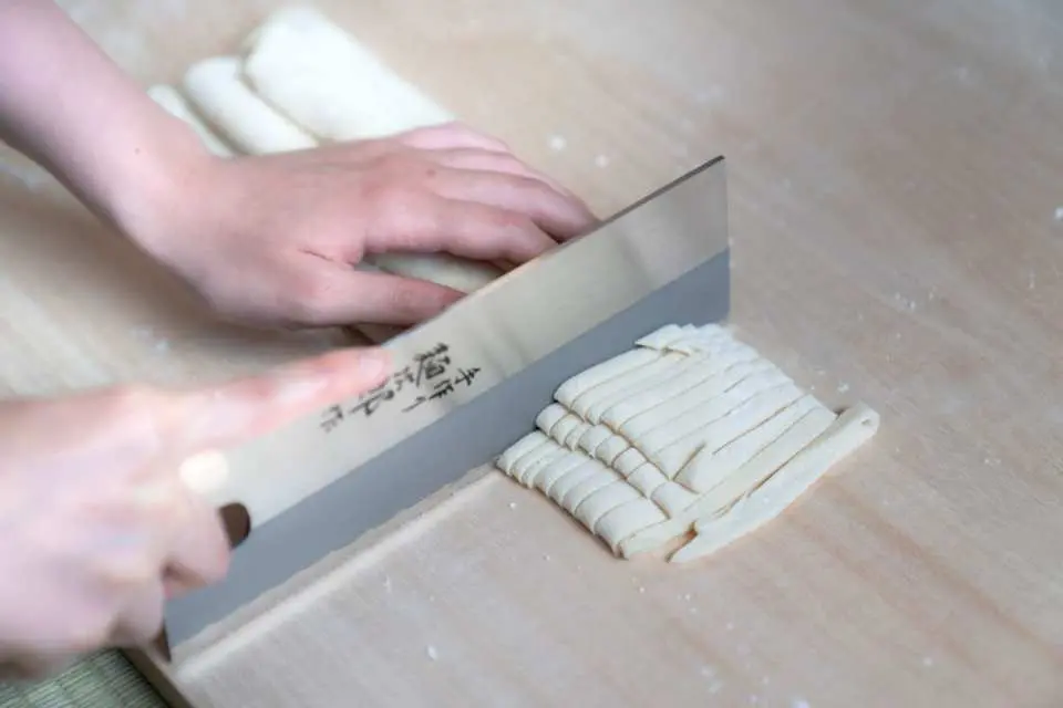 Cut the dough into strips.