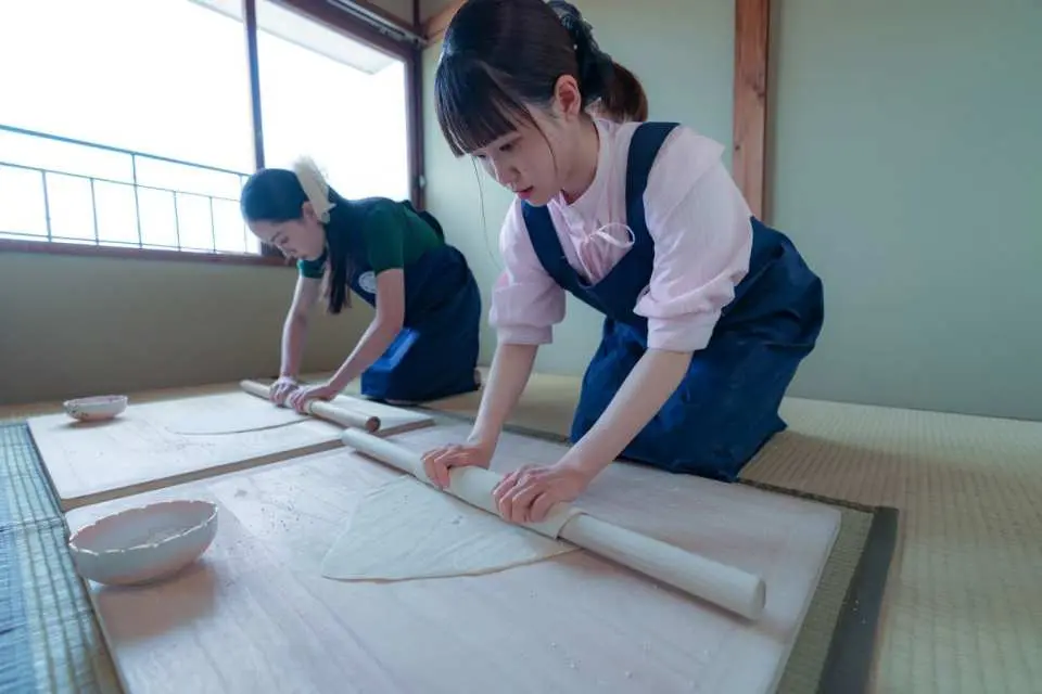 Use a rolling pin to spread it out further.
