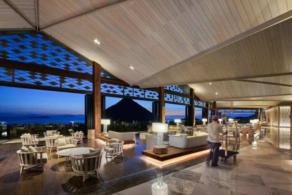 The resort lobby welcomes you with its open design, blending contemporary luxury with natural elements, setting the tone for your entire stay