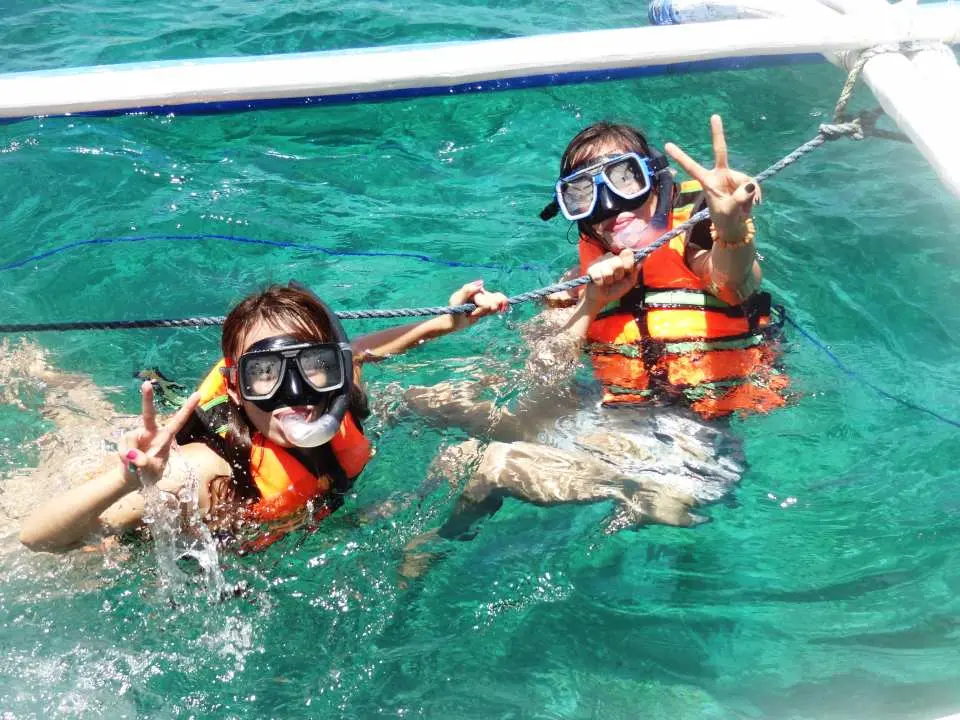 Go to Coral Garden for snorkeling (Amihan Season Only).