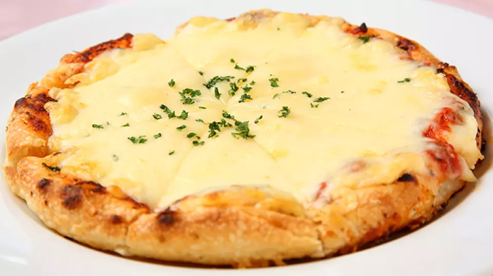 The "Veal Cheese Cutlet with Tomato Sauce 'Veel Parmesan'" is a long-loved dish with homemade tomato sauce and cheese topping. Be sure to also try the "Pappardelle," a wide handmade pasta, and the "Antonio Original" pizza, topped with tomato sauce, anchovies, and plenty of cheese.