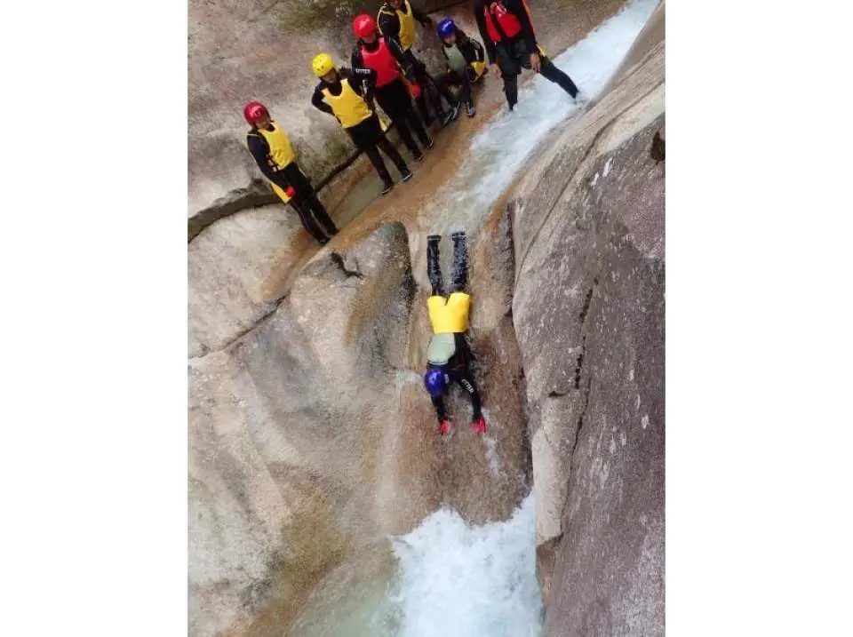 Nakama Falls. A smooth, sloping waterfall.