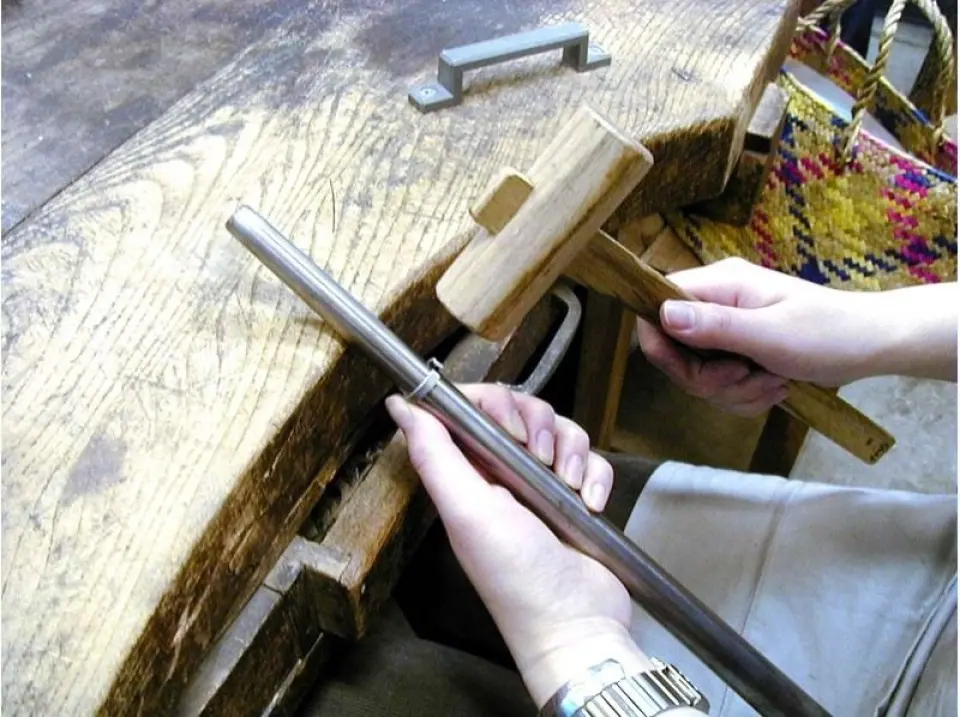 The silver is heated and shaped into a round shape so that it is easy to work with.